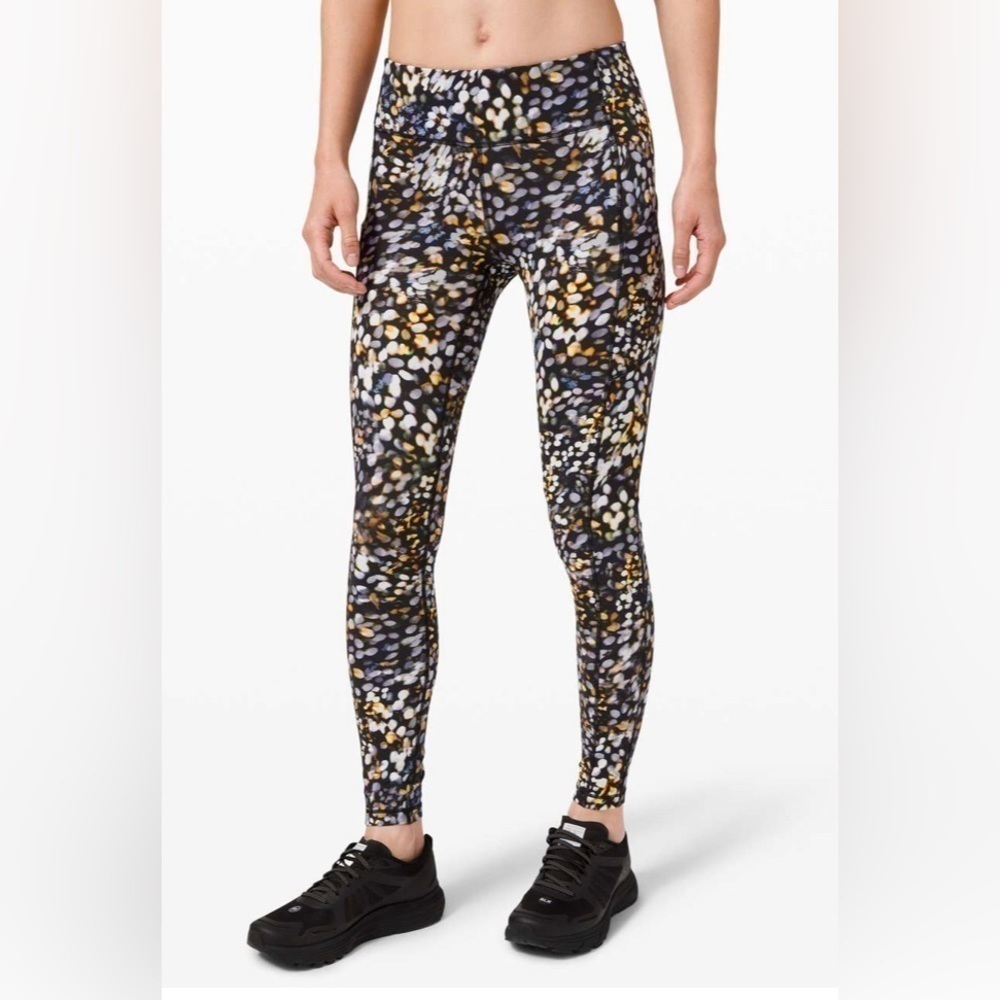 Lululemon. Speed Up Tight 28 in. Full On Luxtreme. Metropolis Glow Multi. Size 8